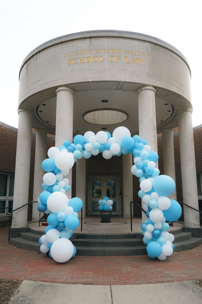 The portico in front of UNC Law School decorated with balloons for the End Well wellness event.