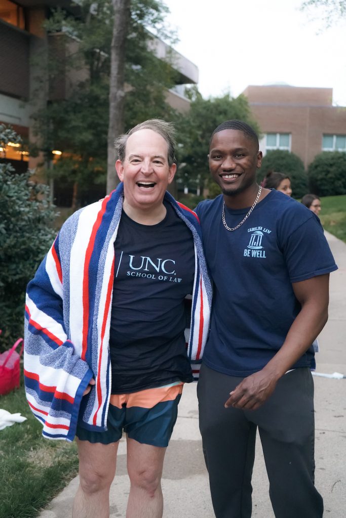 Dean Martin Brinkley poses with SBA President Trey Ellis after getting out of the dunk tank.