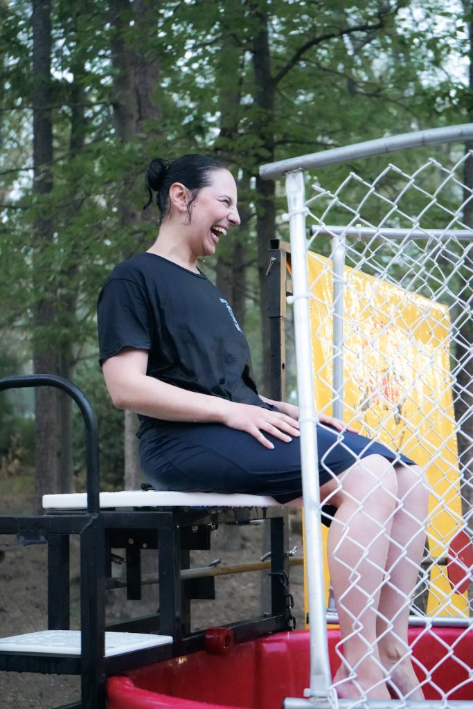 Professor Rachel Gurvich laughs after being dunked in the dunk tank.