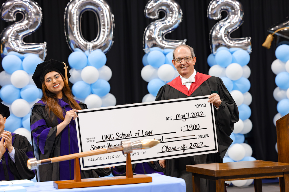 3L Class President Sabrina Shah, presents the check for the 3L class gift to Dean Martin Brinkley.