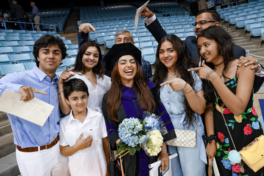 3L Class President Sabrina Shah poses with her family after commencement