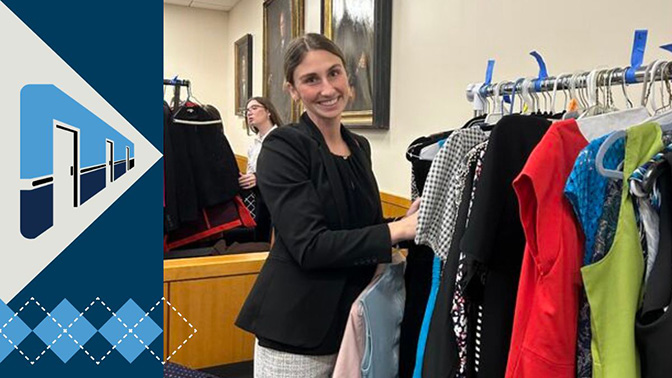 student with clothes rack