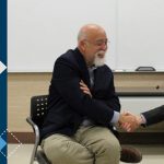 photo of two men seated